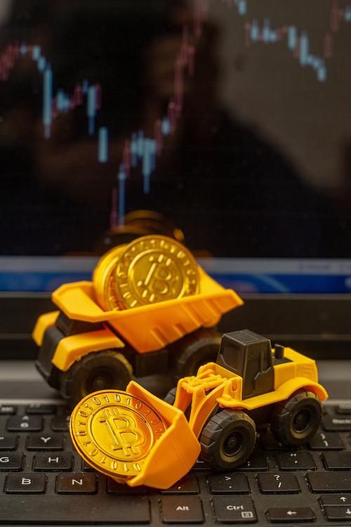 A close-up of a person inspecting the components of a Bitcoin mining rig