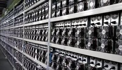 A large-scale mining farm utilizes advanced cooling systems to manage heat generated by the mining rigs.